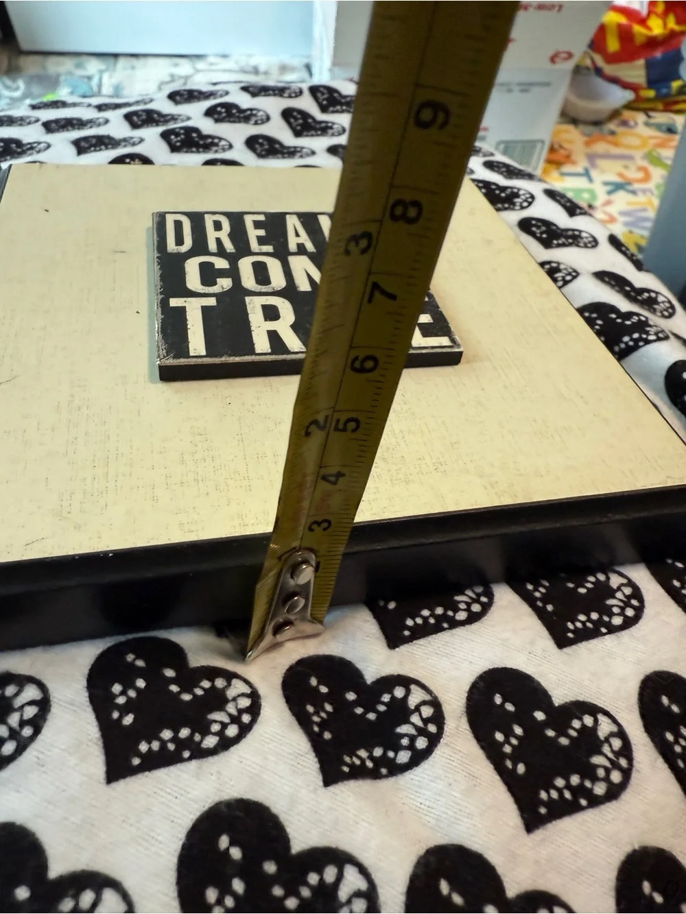 inspirational wall plaques feature distressed black typography on a white